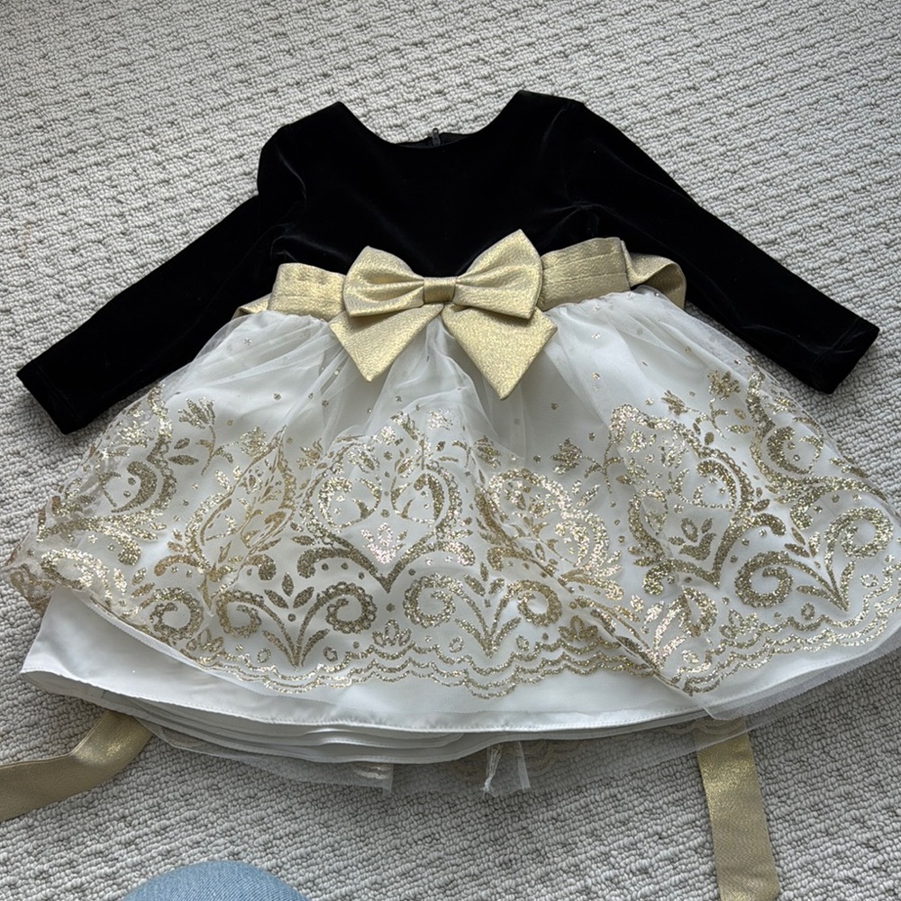 Elegant Black and Gold Dress with Bow